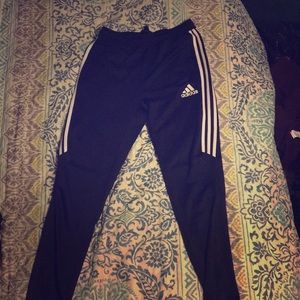 Kids black Adidas joggers.